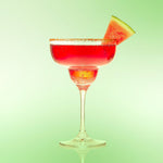Do'Mo Spicy Watermelon Margarita served in a contemporary margarita glass with a melon and chilli garnish