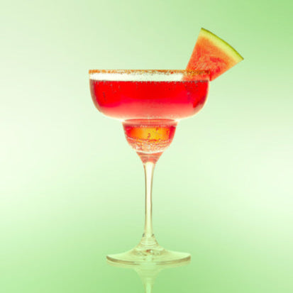 Do'Mo Spicy Watermelon Margarita served in a contemporary margarita glass with a melon and chilli garnish